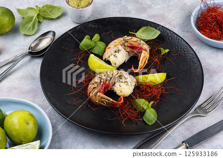 Preparing lobster tails. Preparing lobster tails. 125933186