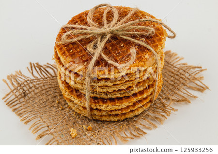 Foot care procedure with medical gloves on patients toes 125933256