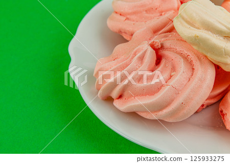 Foot care procedure with medical gloves on patients toes 125933275