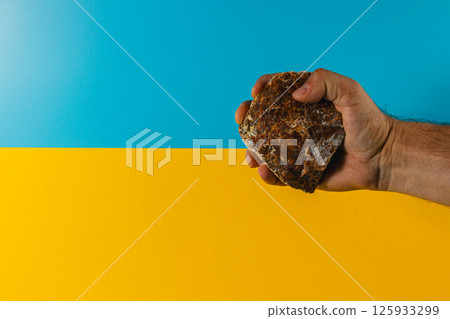 Foot care procedure with medical gloves on patients toes 125933299