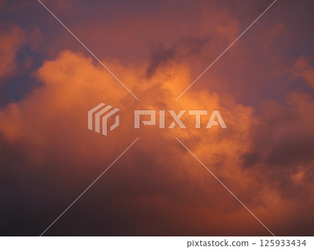 Orange sunset clouds Orange sunset clouds 125933434