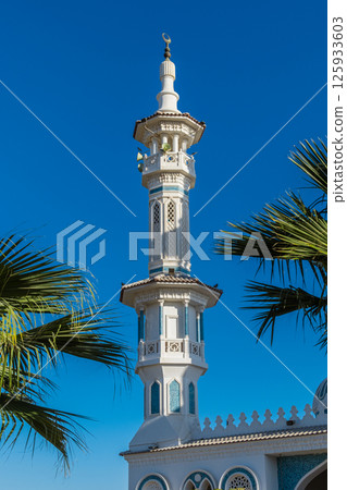 White minaret of mosque in Arabic city White minaret of mosque in Arabic city 125933603