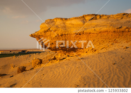 Yellow sand dunes in the desert Sahara in Egypt Yellow sand dunes in the desert Sahara in Egypt 125933802