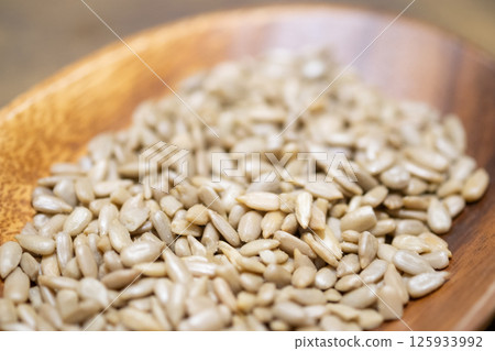 Image of sunflower seeds as a snack (stock photo) Image of sunflower seeds as a snack (stock photo) 125933992