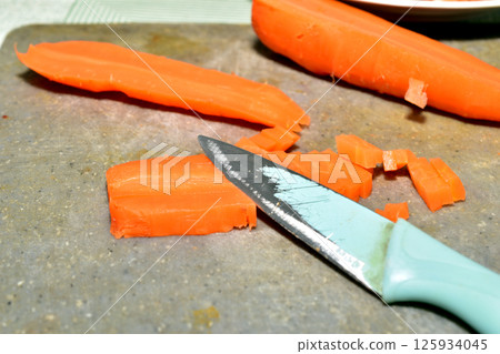 Boiled carrots cut in half. Boiled carrots cut in half. 125934045