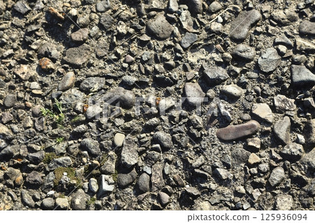 Concrete road with stones embedded Concrete road with stones embedded 125936094