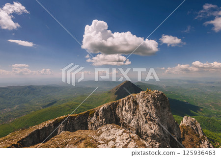 Father and Son Hiking Together in Mountains Father and Son Hiking Together in Mountains 125936463