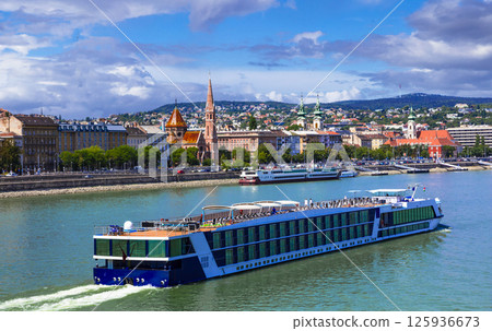 Beautiful capital of Hungary - Budapest. View of downtown and  Danube river with ferry boats.   125936673