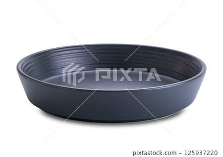 Side view of black ceramic plate isolated on white background. Side view of black ceramic plate isolated on white background. 125937220