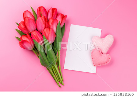 Pink tulip bouquet with a handmade hearts and blank greeting card Pink tulip bouquet with a handmade hearts and blank greeting card 125938160