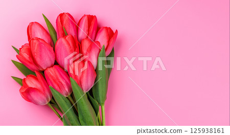 Pink tulip bouquet on a soft pink background Pink tulip bouquet on a soft pink background 125938161