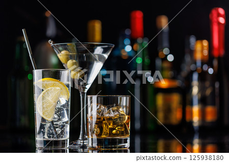 Various cocktails on a bar table 125938180