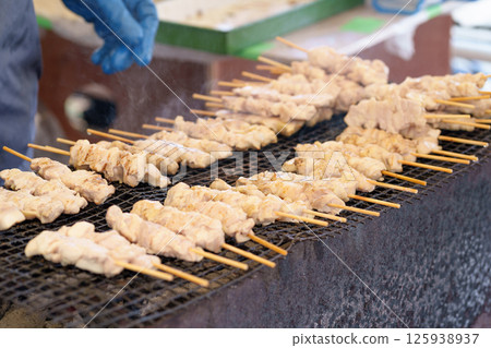 Barbecue cooking scene: Yakitori 125938937