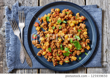 ground beef stew of potatoes and chopped tomatoes ground beef stew of potatoes and chopped tomatoes 125939650