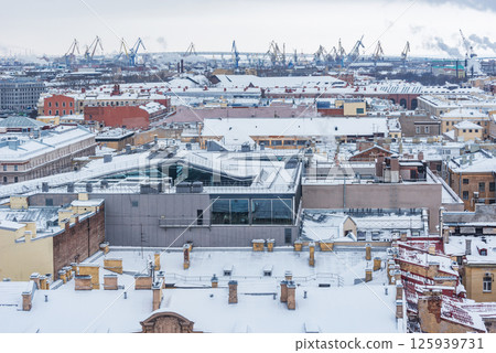 Old buildings roofs under the snow. Saint Petersburg. Russia. 125939731