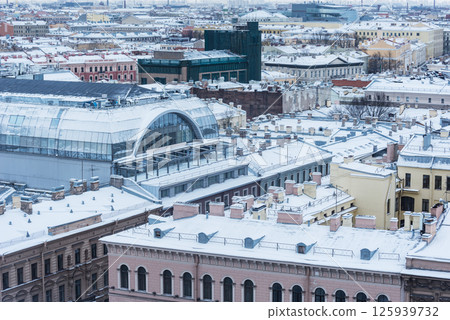 Old buildings roofs under the snow. Saint Petersburg. Russia. 125939732