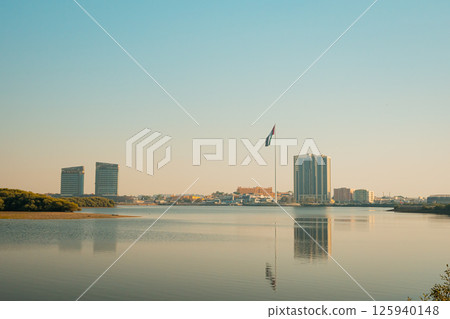 Ras al Khaimah city view, Palm-lined walkway 125940148