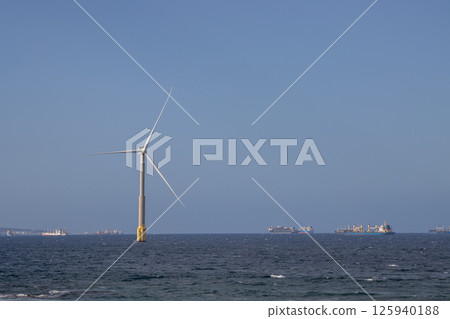 Wind turbine in Atlantic ocean, Telde, Gran Canaria 125940188