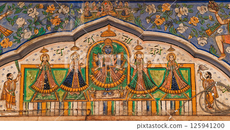 Old-painted Walls. Frescoes On Wall Of Hanuman Temple In Jaipur, India. Religious Motifs From Life Of Vishnu Also Known As Narayana And Hari, Is One Of Principal Deities Of Hinduism. He Is Supreme Old-painted Walls. Frescoes On Wall Of Hanuman Temple In Jaipur, India. Religious Motifs From Life Of Vishnu Also Known As Narayana And Hari, Is One Of Principal Deities Of Hinduism. He Is Supreme 125941200