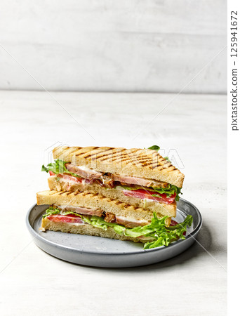 club sandwich on grey plate club sandwich on grey plate 125941672