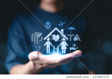 Family Health Insurance Concept. A hand presenting glowing icons representing family health insurance, protection, safety, medical care, financial security, and wellness. life insurance, 125942272