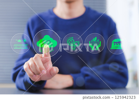 Reduce CO2 emission concept. Person pointing at transparent environmental icon, including CO2 reduction, solar energy, recycling, sustainable practices, and eco-friendly initiatives. carbon neutrality 125942323