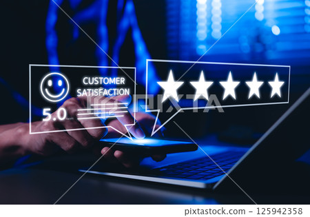 Five-star rating review and Customer satisfaction concept. Man using smartphone to give five-star rating, customer satisfaction, feedback, and online reviews. business reputation and quality service. Five-star rating review and Customer satisfaction concept. Man using smartphone to give five-star rating, customer satisfaction, feedback, and online reviews. business reputation and quality service. 125942358