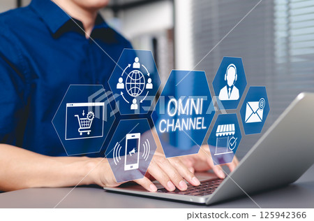 Omni Channel Digital Marketing and E-Commerce concept. Businessman with omni-channel market icon, customer engagement, online sales, print ads, website, social media, call center, email, store, mobile 125942366