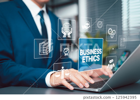 Business Ethics and Corporate Responsibility Concept. Businessman working on laptop with icons business ethics, compliance, integrity, ethical investment, responsibility principles, sustainable, 125942395