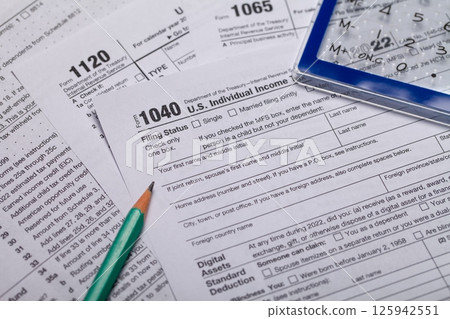 Income tax with instruction. Tax payment and filing concept 125942551