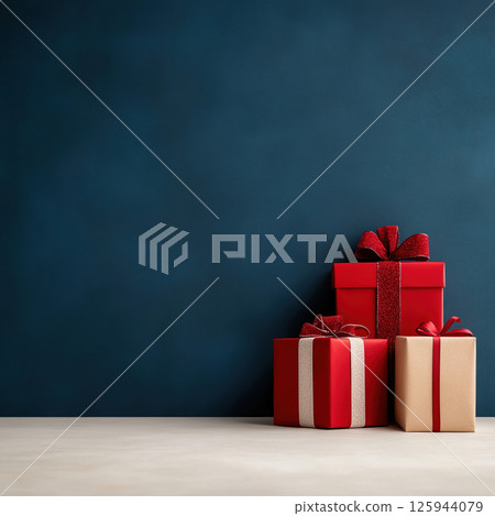 Luxury red gifts box natural ribbon blue background, birthday, Christmas, copy space, advertisement 125944079