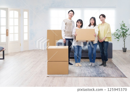 Family packing for moving 125945370