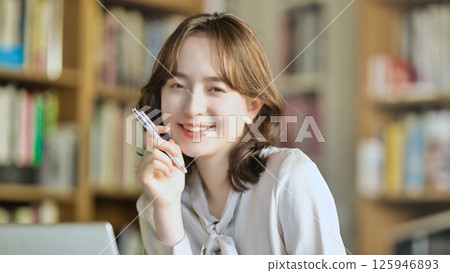 Young woman working in the office 125946893