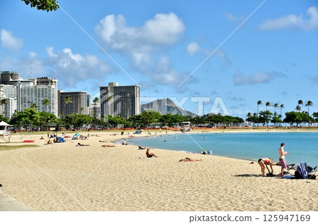 People playing on the beach 125947169