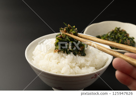 Braised daikon leaf radish on rice Rice topped with daikon leaf radish sprinkles 125947626