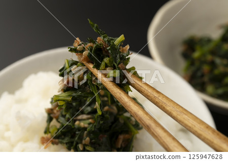 Braised daikon leaf radish on rice Rice topped with daikon leaf radish sprinkles 125947628