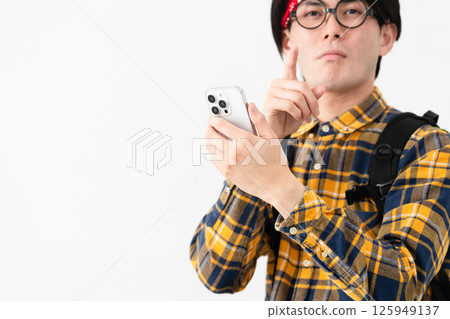 Young man wearing checked clothes Young man wearing checked clothes 125949137