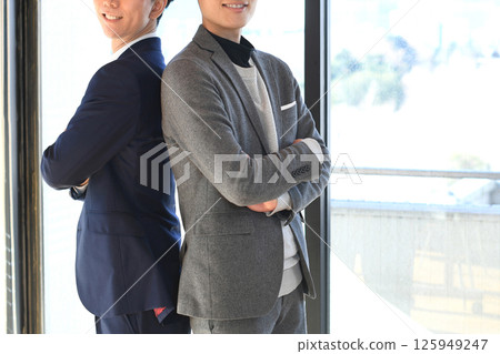 Smiling Asian business men 125949247