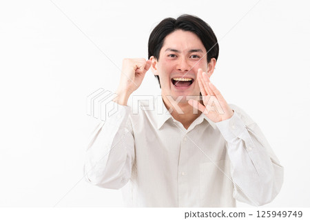 Young man wearing a long-sleeved white shirt Young man wearing a long-sleeved white shirt 125949749
