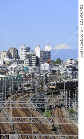Mount Fuji seen from "Tokyo Fujimizaka" on the Ookayama campus of Tokyo University of Science (formerly Tokyo Institute of Technology), and a Tokyu train Mount Fuji seen from "Tokyo Fujimizaka" on the Ookayama campus of Tokyo University of Science (formerly Tokyo Institute of Technology), and a Tokyu train 125950402