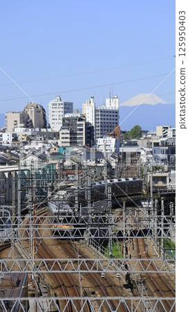 Mount Fuji as seen from "Tokyo Fujimisaka" on the Ookayama campus of Tokyo University of Science (formerly Tokyo Institute of Technology), and a Tokyu train Mount Fuji as seen from "Tokyo Fujimisaka" on the Ookayama campus of Tokyo University of Science (formerly Tokyo Institute of Technology), and a Tokyu train 125950403