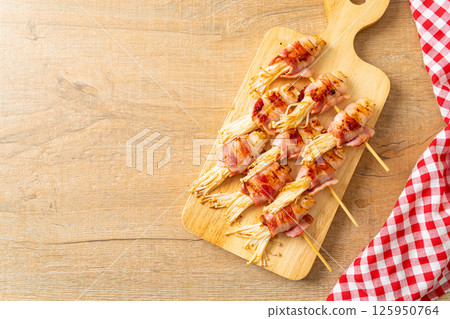 Bacon Wrapped Golden Needle Mushroom 125950764
