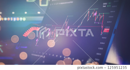 Stock Market Trading Graph on Digital Tablet 125951235