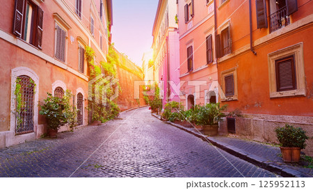 Colorful Cobblestone Street in a European Town at Sunset 125952113