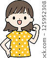 A woman with short hair and upper body wearing pajamas is cheering 125952308