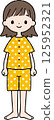 A woman with short hair and an upper body wearing pajamas 125952321