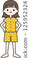 A short-haired woman in pajamas is full of confidence 125952324