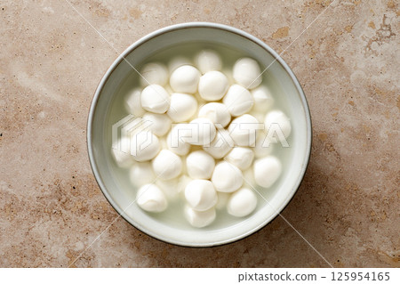 Mozzarella cheese balls, top view Mozzarella cheese balls, top view 125954165
