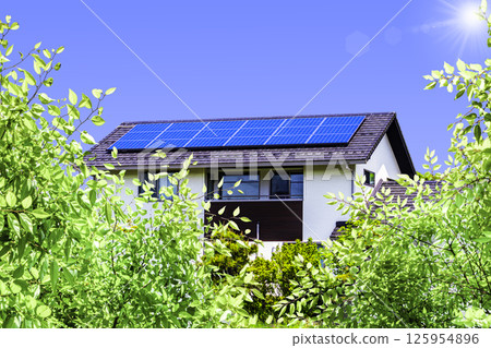 Eco image_fresh greenery, sky, eco house and sun Eco image_fresh greenery, sky, eco house and sun 125954896