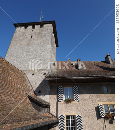 Stony castle tower in European Murten town in Switzerland - vertical 125955698